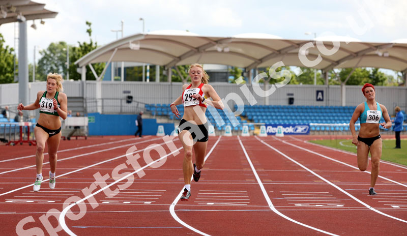 295 Harriet Pryke (Manx Harriers) wins the senior womens 200 metres from 319 Jess Taylor (Sale) and 306 Amanda Shaw (Barnsley AC), Northern Championships, Sport City, Manchester